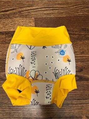 NWOT Splash About Yellow Floral Kids Swim Diaper. Size XL 12-24 Months.